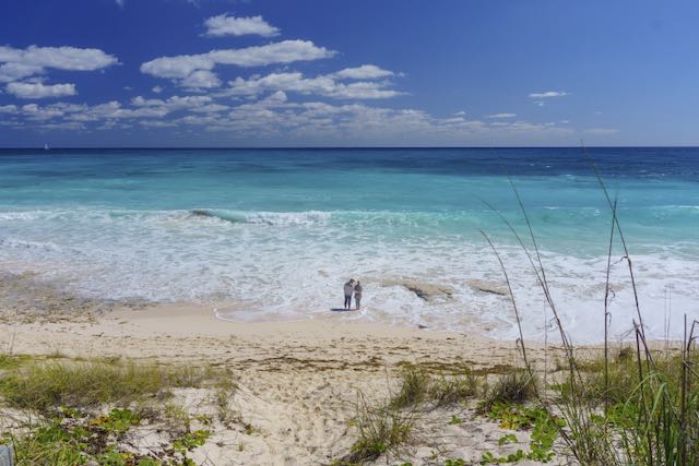 Couple on Elbow Cay beach, Bahamas